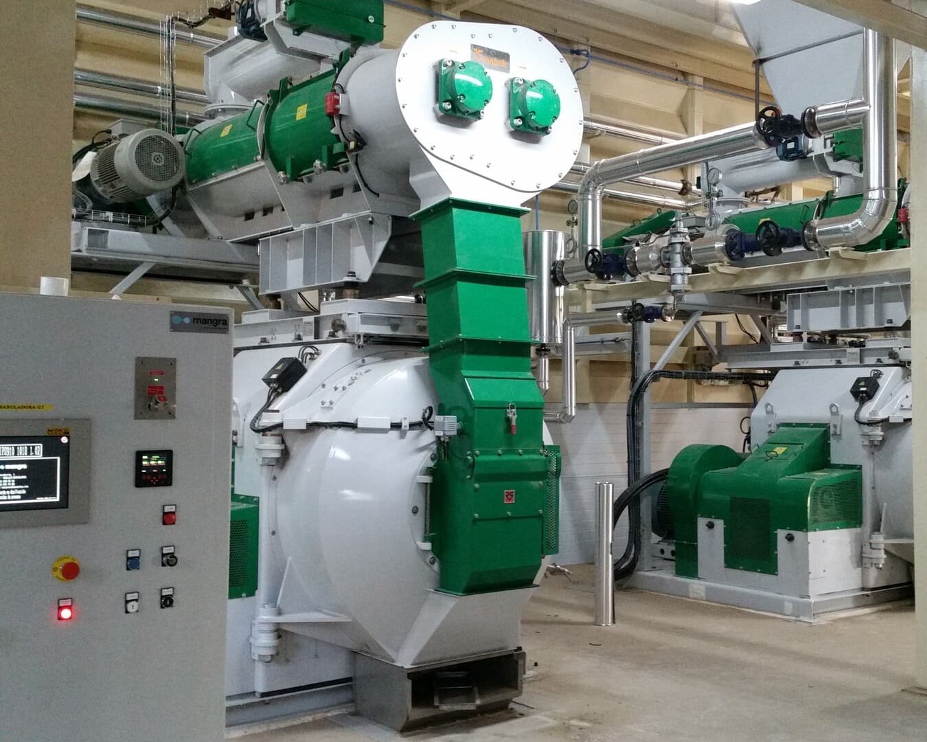 Two Mabrik green and white pelletizers in a feed mill